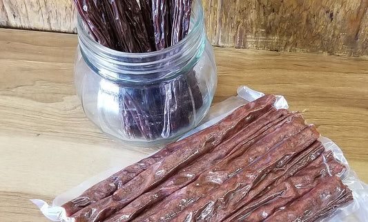 Naturally Wild grass-fed wild game dog treats in eco-friendly packaging